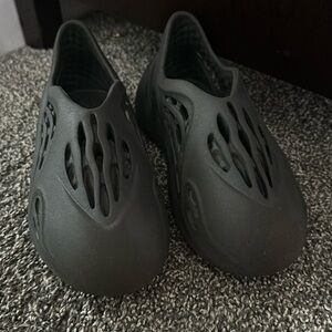 Yeezy black foam runner, in good condition. Size 12K.